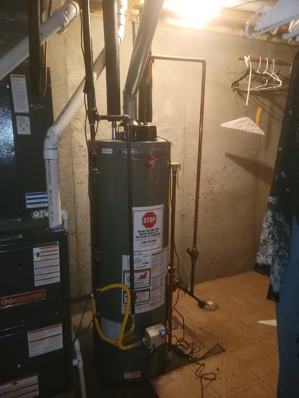 Residential water heater installed in a basement